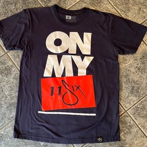 Mens 1.1.Six tshirt.  Navy with orange and white writing on the front.